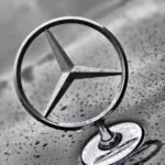 mercedes-benz-closeup-logo-black-car-rain-drops-81996881